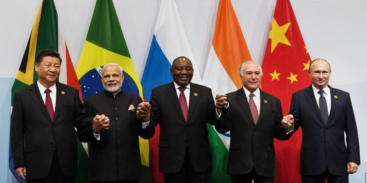 The Prime Minister, Shri Narendra Modi in the BRICS Family Photograph with other Leaders, at the 10th BRICS Summit, at the Sandton International Convention Centre, in Johannesburg, South Africa on July 26, 2018.