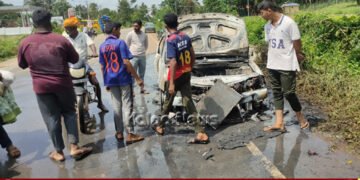 Car bursts into flames in the middle of the road