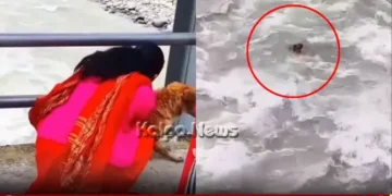 Nepal Woman Throws Dog into seti river copy